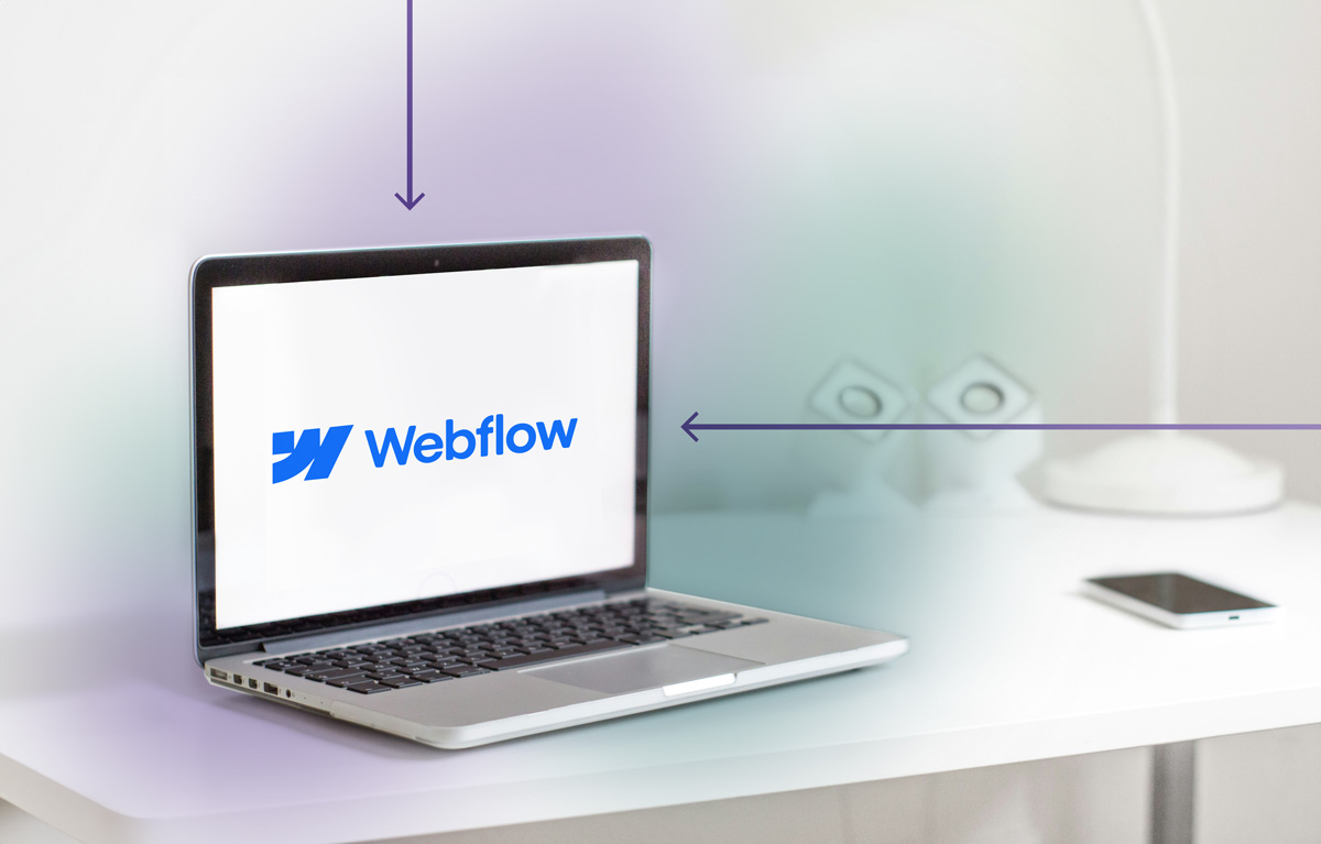 Was ist Webflow? Laptop mit Webflow Logo